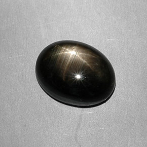 Zafiro estrella negro natural de 7,49 ct, corte óvalo, opaco