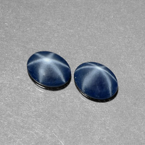 Gemas de zafiro estrella azul natural de  ct, corte óvalo, translúcido