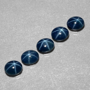 Gemas de zafiro estrella azul natural de  ct, corte óvalo, translúcido