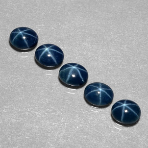 Gemas de zafiro estrella azul natural de  ct, corte óvalo, translúcido