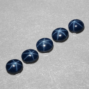 Gemas de zafiro estrella azul natural de  ct, corte óvalo, opaco