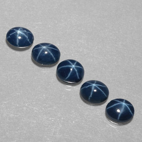 Gemas de zafiro estrella azul natural de  ct, corte óvalo, opaco