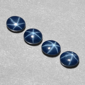 Gemas de zafiro estrella azul natural de  ct, corte óvalo, opaco