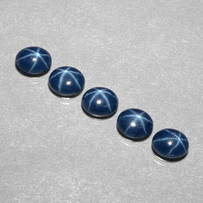 Gemas de zafiro estrella azul natural de  ct, corte óvalo, opaco