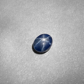 Zafiro estrella azul natural de 0,67 ct, transparente, transparente / translúcido