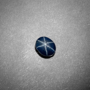 Zafiro estrella azul natural de 0,62 ct, transparente, transparente / translúcido