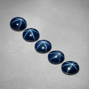 Gemas de zafiro estrella azul natural de  ct, corte óvalo, opaco