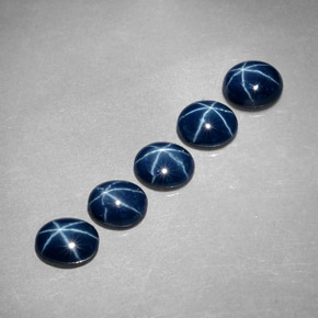 Gemas de zafiro estrella azul natural de  ct, corte óvalo, opaco
