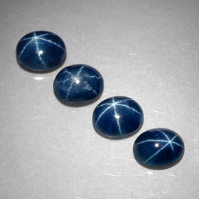 Gemas de zafiro estrella azul natural de  ct, corte óvalo, translúcido
