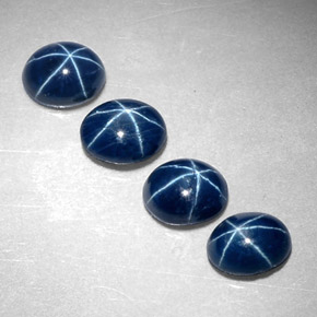 Gemas de zafiro estrella azul natural de  ct, corte óvalo, opaco