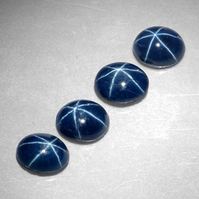 Gemas de zafiro estrella azul natural de  ct, corte óvalo, opaco
