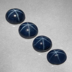Gemas de zafiro estrella azul natural de  ct, corte óvalo, opaco
