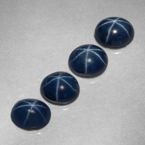 Gemas de zafiro estrella azul natural de  ct, corte óvalo, opaco