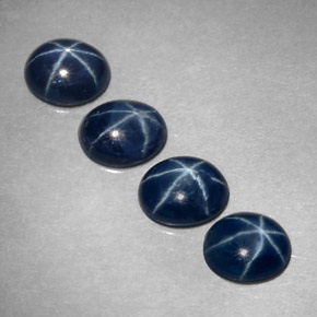 Gemas de zafiro estrella azul natural de  ct, corte óvalo, opaco
