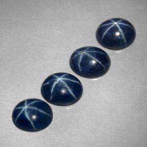 Gemas de zafiro estrella azul natural de  ct, corte óvalo, opaco