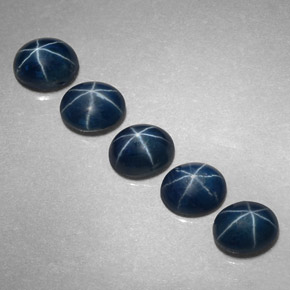 Gemas de zafiro estrella azul natural de  ct, corte óvalo, opaco