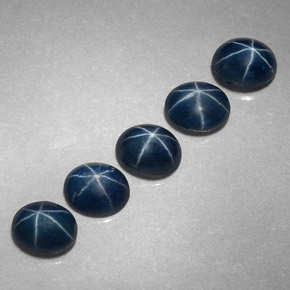 Gemas de zafiro estrella azul natural de  ct, corte óvalo, opaco
