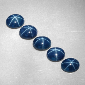 Gemas de zafiro estrella azul natural de  ct, corte óvalo, opaco