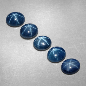 Gemas de zafiro estrella azul natural de  ct, corte óvalo, translúcido