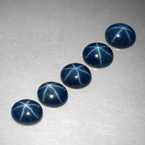 Gemas de zafiro estrella azul natural de  ct, corte óvalo, translúcido
