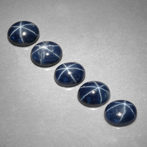Gemas de zafiro estrella azul natural de  ct, corte óvalo, opaco