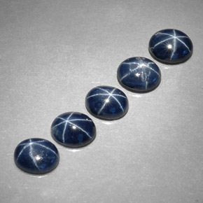 Gemas de zafiro estrella azul natural de  ct, corte óvalo, opaco
