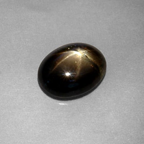 Zafiro estrella negro natural de 1,80 ct, corte óvalo, translúcido