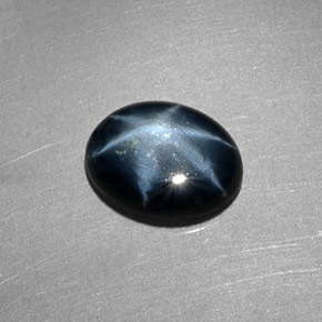 Zafiro estrella Azul oscuro natural de 1.56 ct, Corte Óvalo, Translúcido