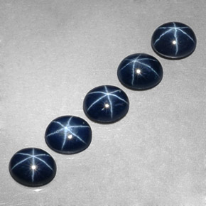 Gemas de zafiro estrella azul natural de  ct, corte óvalo, opaco