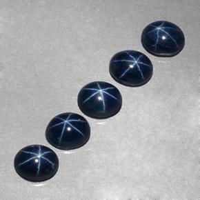 Gemas de zafiro estrella azul natural de  ct, corte óvalo, opaco