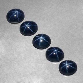 Gemas de zafiro estrella azul natural de  ct, corte óvalo, opaco