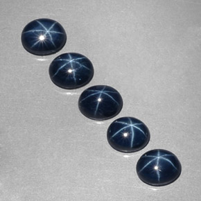 Gemas de zafiro estrella azul natural de  ct, corte óvalo, opaco
