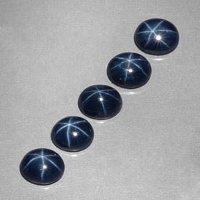 Gemas de zafiro estrella azul natural de  ct, corte óvalo, opaco