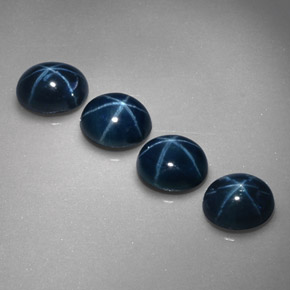 Gemas de zafiro estrella azul natural de  ct, corte óvalo, opaco