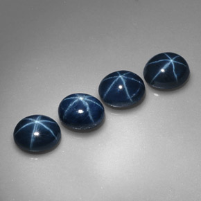 Gemas de zafiro estrella azul natural de  ct, corte óvalo, opaco