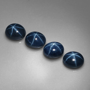 Gemas de zafiro estrella azul natural de  ct, corte óvalo, opaco