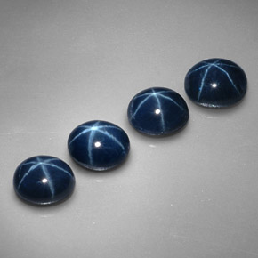 Gemas de zafiro estrella azul natural de  ct, corte óvalo, opaco