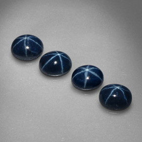 Gemas de zafiro estrella azul natural de  ct, corte óvalo, opaco