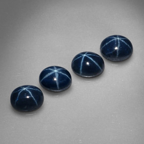 Gemas de zafiro estrella azul natural de  ct, corte óvalo, opaco