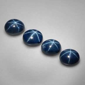 Gemas de zafiro estrella azul natural de  ct, corte óvalo, opaco