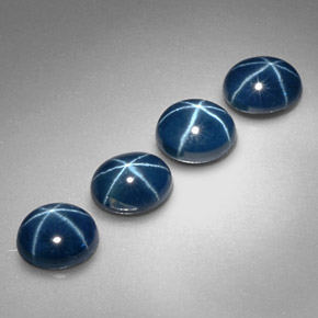 Gemas de zafiro estrella azul natural de  ct, corte óvalo, opaco