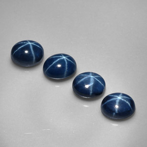Gemas de zafiro estrella azul natural de  ct, corte óvalo, opaco