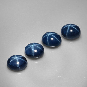 Gemas de zafiro estrella azul natural de  ct, corte óvalo, opaco