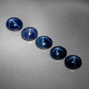 Gemas de zafiro estrella azul natural de  ct, corte óvalo, opaco