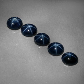 Gemas de zafiro estrella azul natural de  ct, corte óvalo, opaco