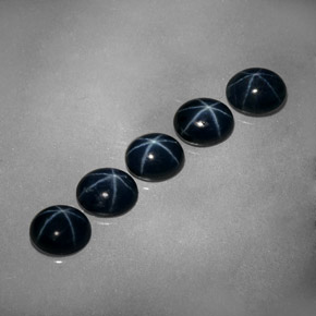 Gemas de zafiro estrella azul natural de  ct, corte óvalo, opaco