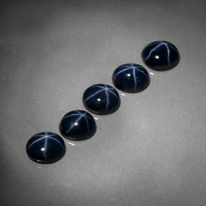 Gemas de zafiro estrella azul natural de  ct, corte óvalo, opaco