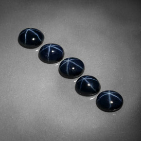 Gemas de zafiro estrella azul natural de  ct, corte óvalo, opaco