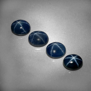 Gemas de zafiro estrella azul natural de  ct, corte óvalo, opaco
