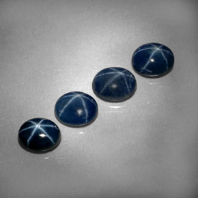 Gemas de zafiro estrella azul natural de  ct, corte óvalo, opaco